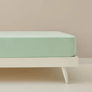 Sábana bajera de algodón de punto ajustable Kinbi